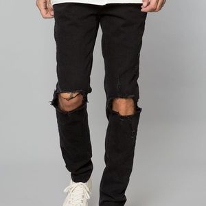 BLACK DESTRUCTED DENIM SKINNY TAPERED PANT